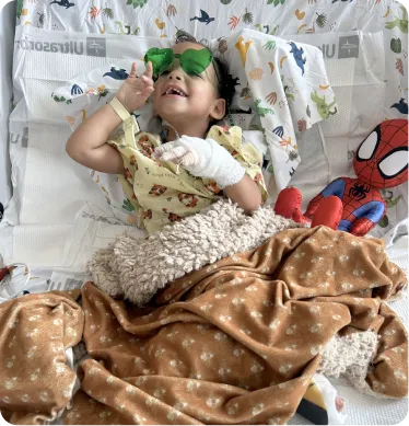child in hospital bed