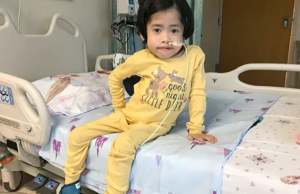 child in hospital bed