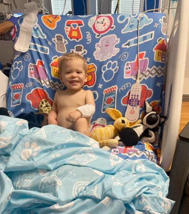 child in hospital bed